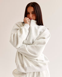 Woman wearing Go-To Oversized Quarter Zip Sweater - Silver Marl | Model:Eliza | Size:XS | Thumbnail Index: 0