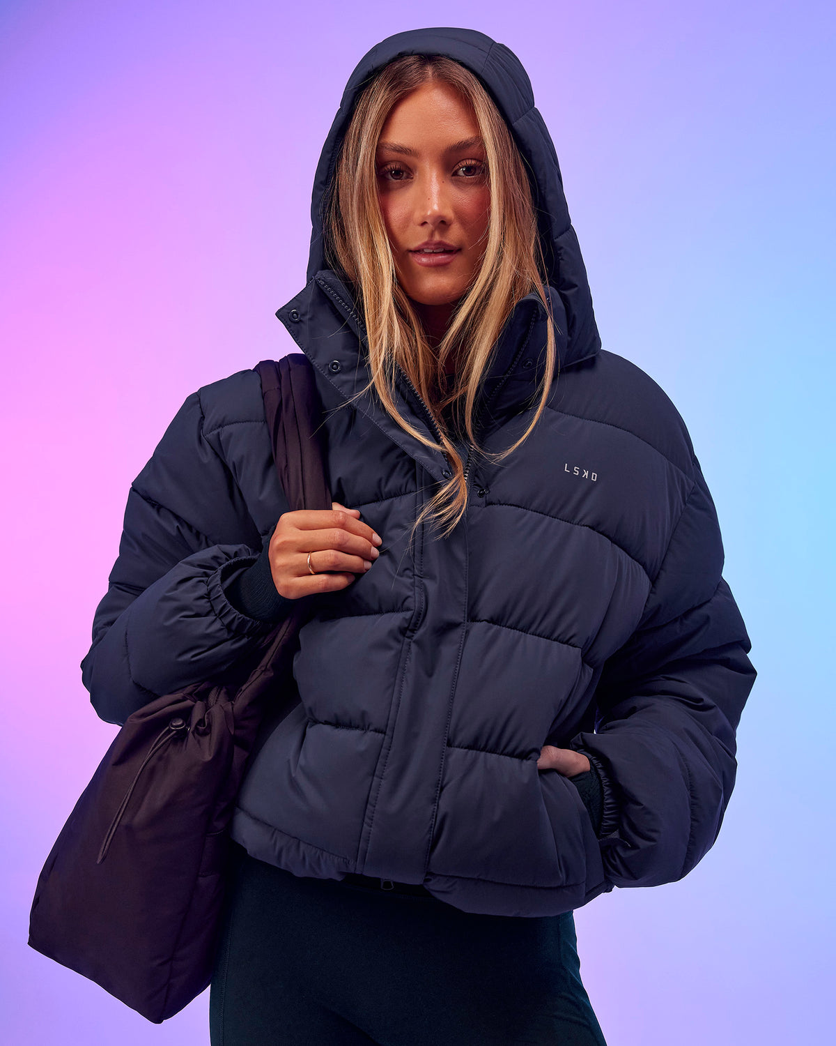 Woman wearing Go-To Puffer Jacket - Future Navy | Model:Georgia | Size:XS