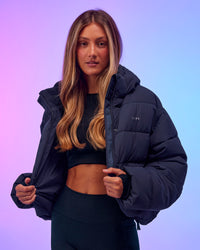 Woman wearing Go-To Puffer Jacket - Future Navy | Model:Georgia | Size:XS | Thumbnail Index: 4