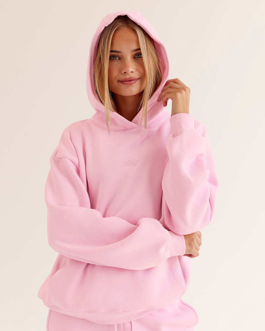 Woman wearing Go-To Script Oversized Hoodie - Marshmallow | Model:Taneisha | Size:XS - view 1