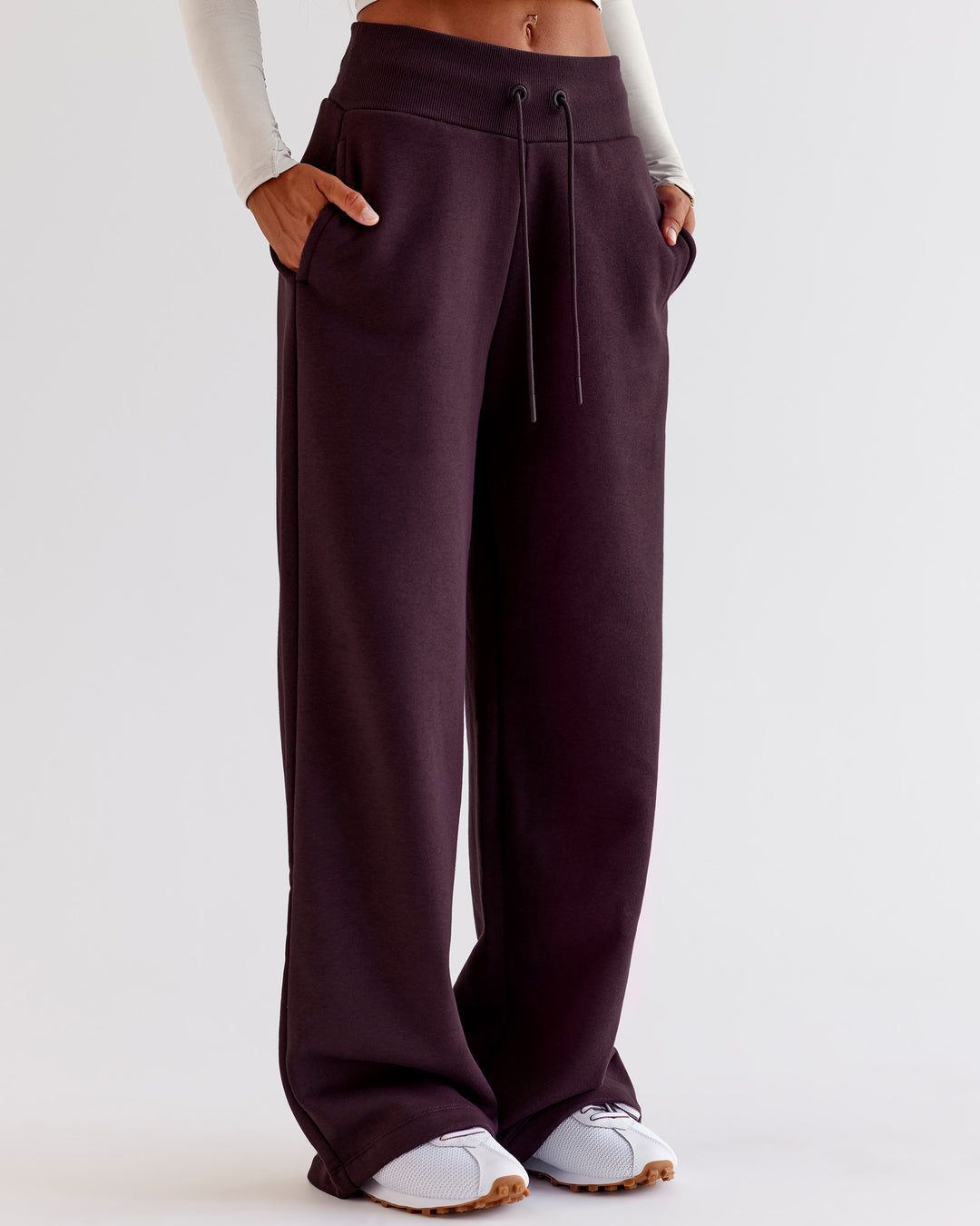 Woman wearing Go-To Wide Leg Track Pant - Midnight Plum | Model:Jaimee | Size:XS - view 1