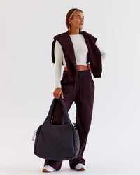 Woman wearing Go-To Wide Leg Track Pant - Midnight Plum | Model:Jaimee | Size:XS | Thumbnail Index: 5