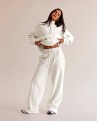 Woman wearing Go-To Wide Leg Track Pant - Silver Marl | Model:Eliza | Size:XS | Thumbnail Index: 1