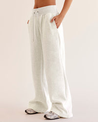 Woman wearing Go-To Wide Leg Track Pant - Silver Marl | Model:Eliza | Size:XS | Thumbnail Index: 0
