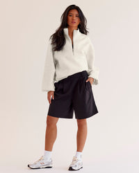 Woman wearing Luxe ZeroCrease Spacer Half Zip - Silver Marl | Model:Loren | Size:XS | Thumbnail Index: 3