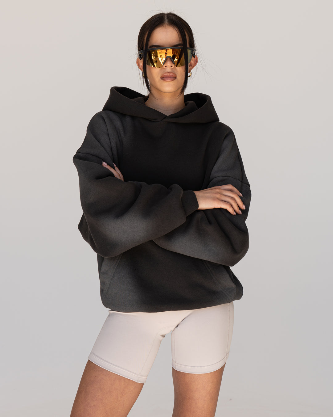 Woman wearing Memory In Motion 500gsm Ultra Heavyweight Washed Hoodie - Charcoal Washed | Model:Eliza | Size:XS - view 12