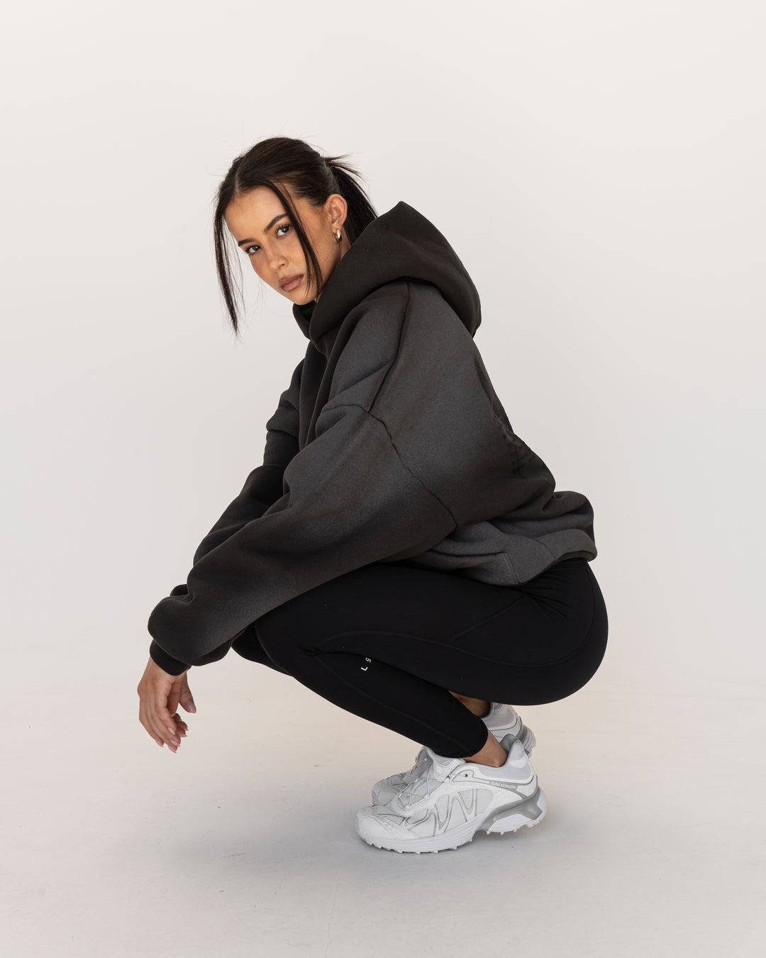 Woman wearing Memory In Motion 500gsm Ultra Heavyweight Washed Hoodie - Charcoal Washed | Model:Eliza | Size:XS - view 5