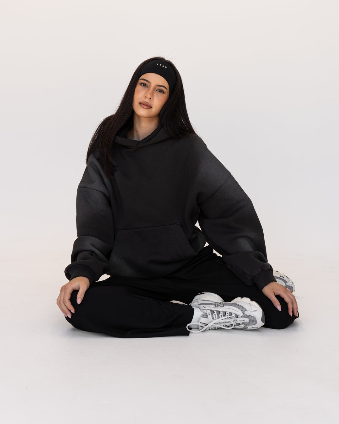Woman wearing Memory In Motion 500gsm Ultra Heavyweight Washed Hoodie - Charcoal Washed | Model:Eliza | Size:XS - view 7