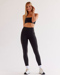 Woman wearing O.G Fusion Ultra High-Rise Full Length Legging Pockets - Black | Model:Taneisha | Size:XS | Thumbnail Index: 8
