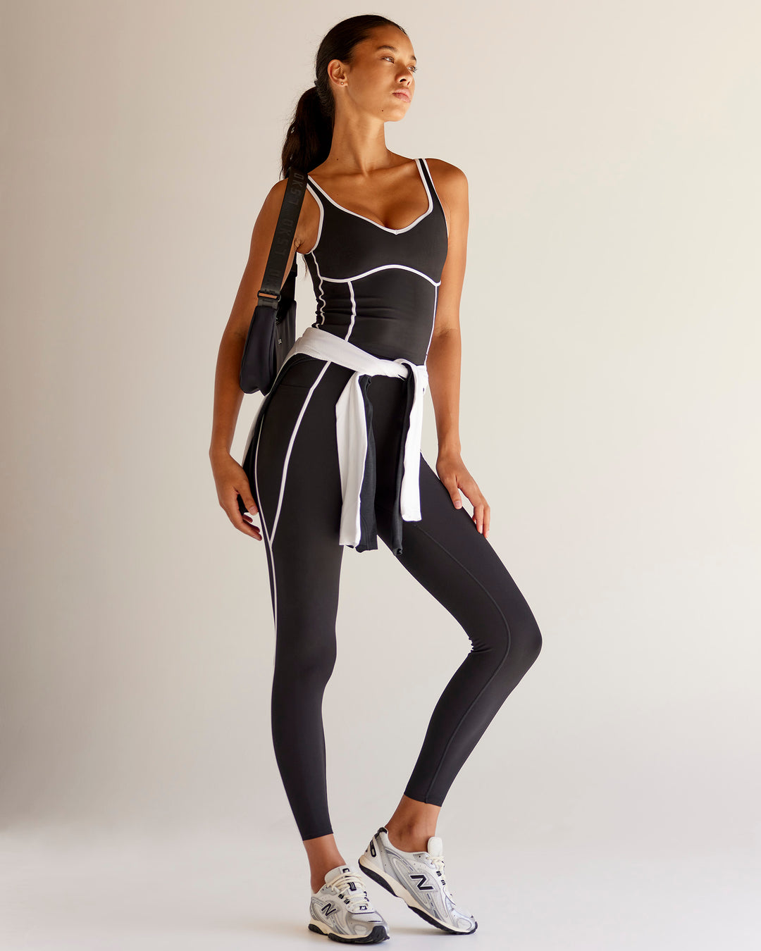 Woman wearing Power Sweetheart Shelf Bra Tank - Black | Model:Tali | Size:XS - view 3