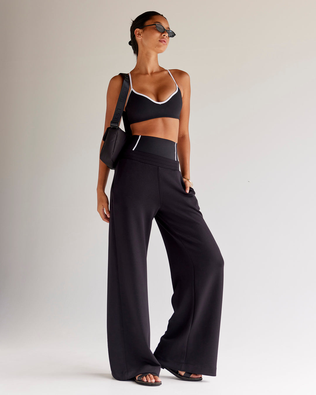 Woman wearing Power Sweetheart Sports Bra - Black | Model:Tali | Size:XS - view 5