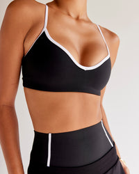 Woman wearing Power Sweetheart Sports Bra - Black | Model:Tali | Size:XS | Thumbnail Index: 0