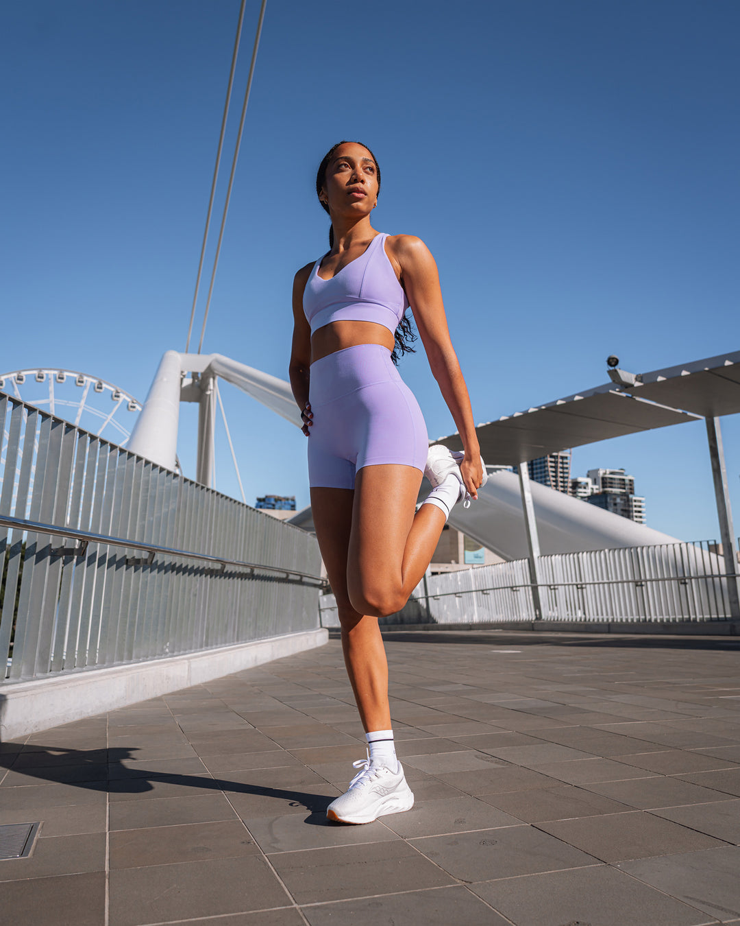 Woman wearing Sculpt Sports Bra - Violet Ray | Model:Txai | Size:XS - view 5