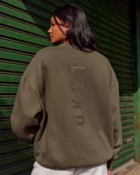 Woman wearing Shadow Mode Oversized Sweater - Walnut Grey | Model:Alex | Size:XS | Thumbnail Index: 3