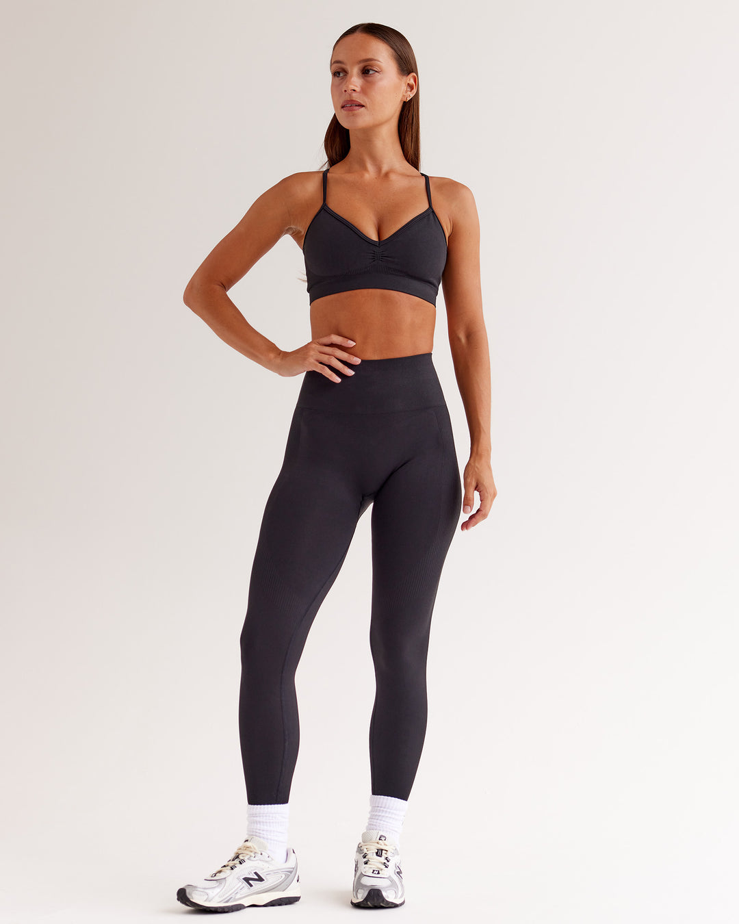 Woman wearing Spark Seamless Sports Bra - Black | Model:Brylee | Size:XS - view 5