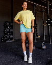 Woman wearing Unfit Club FLXCotton Oversized Tee - Yellow Fizz Washed-Ultra Fuchsia | Model:Abbey | Size:XS | Thumbnail Index: 3