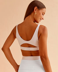 Woman wearing Vitality Sports Bra - White | Model:Brylee | Size:XS | Thumbnail Index: 0