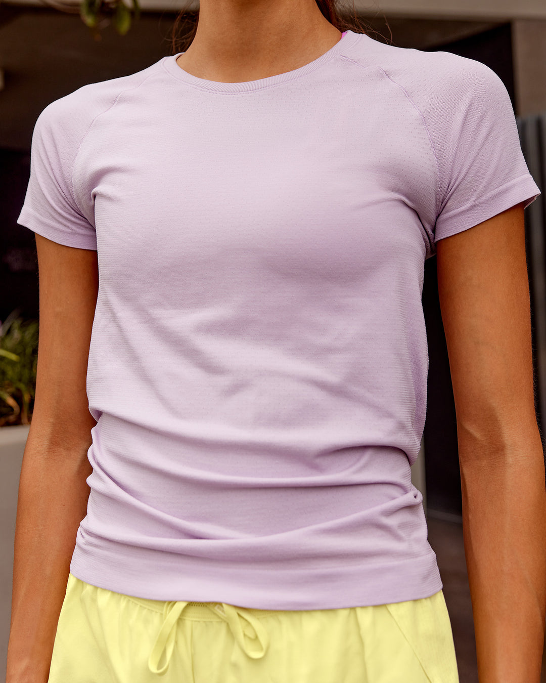 Woman wearing AeroFLX+ Seamless Tee - Fair Orchid/Fair Orchid | Model:Steph | Size:XS - view 1