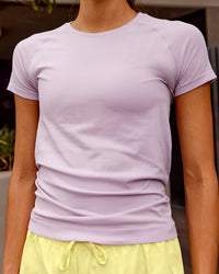 Woman wearing AeroFLX+ Seamless Tee - Fair Orchid/Fair Orchid | Model:Steph | Size:XS | Thumbnail Index: 0