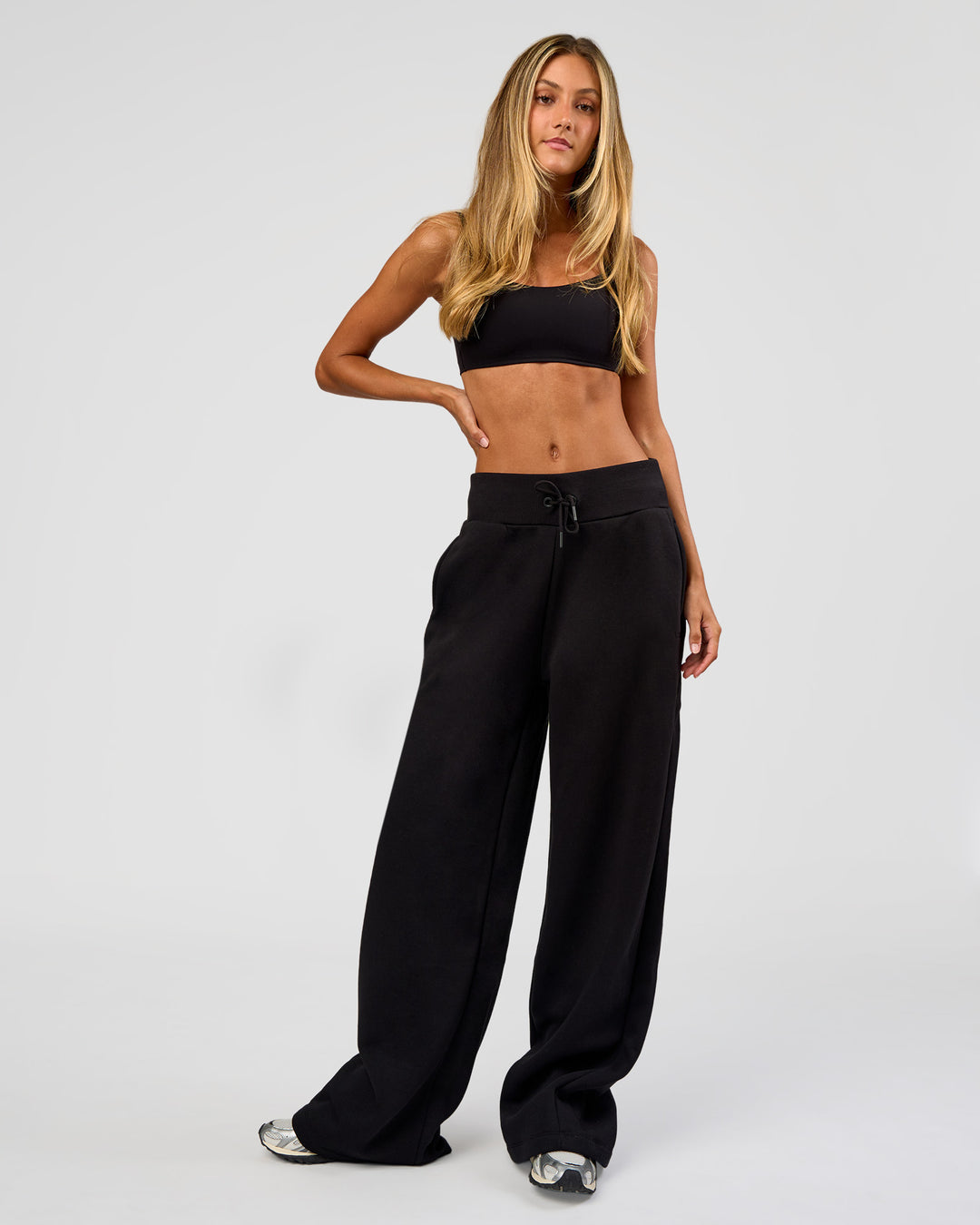 Woman wearing Go-To Wide Leg Track Pant Tall - Black | Model:Georgia | Size:XS - view 2