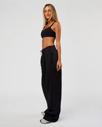 Woman wearing Go-To Wide Leg Track Pant Tall - Black | Model:Georgia | Size:XS | Thumbnail Index: 6
