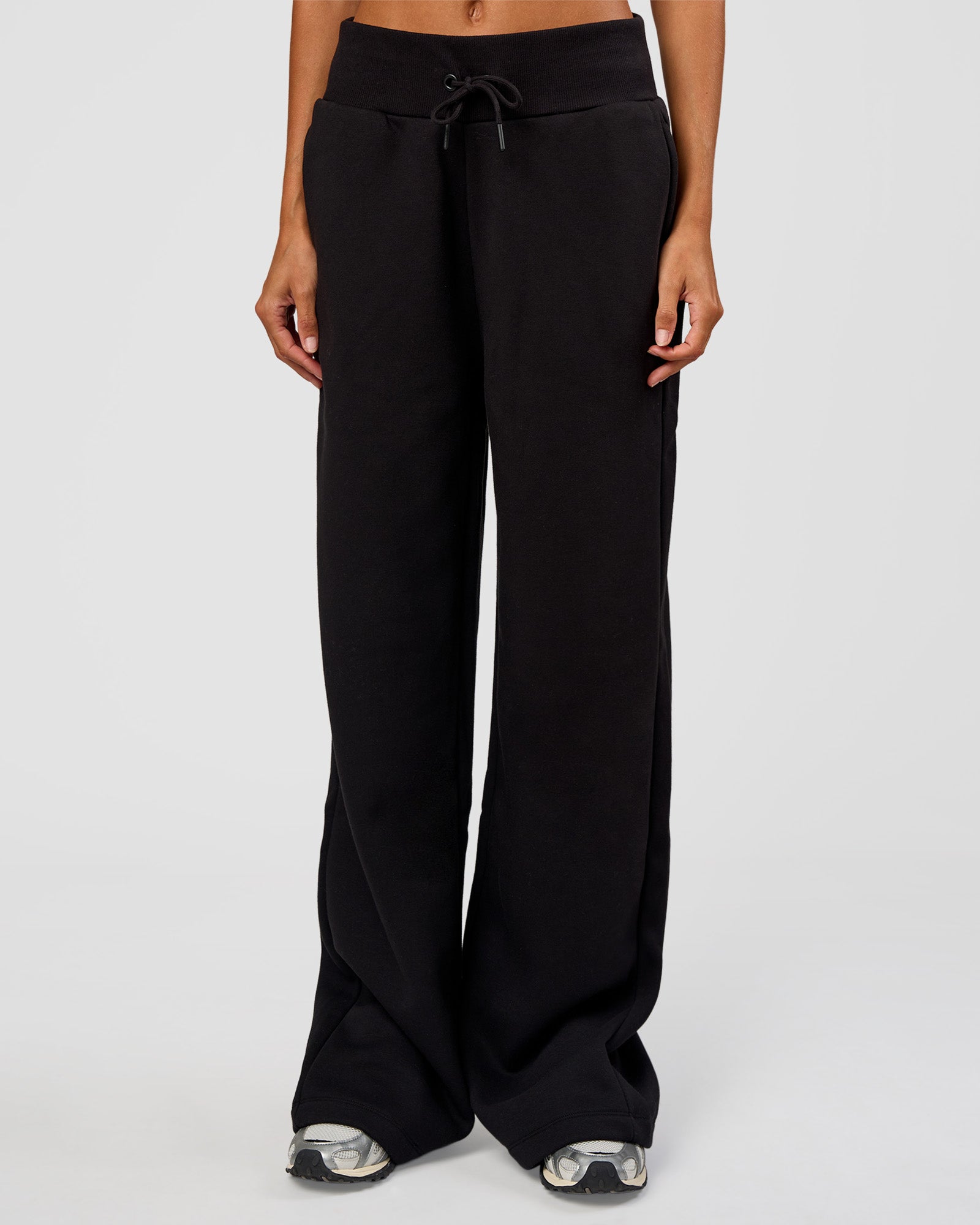 Woman wearing Go-To Wide Leg Track Pant Tall - Black | Model:Georgia | Size:XS