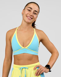 Woman wearing Breeze Sports Bra - Baltic Sea-Lemon | Model:Grace | Size:XS | Thumbnail Index: 5