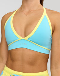 Woman wearing Breeze Sports Bra - Baltic Sea-Lemon | Model:Grace | Size:XS | Thumbnail Index: 6