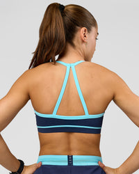 Woman wearing Breeze Sports Bra - Future Navy-Baltic Sea | Model:Grace | Size:XS | Thumbnail Index: 3