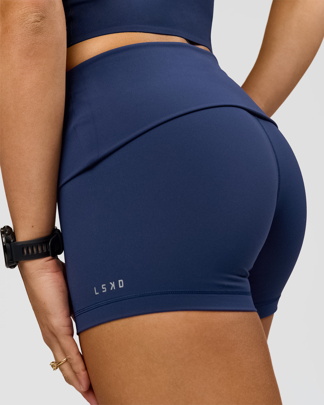 Woman wearing Groovy High Rise Fold Over 4" Short - Future Navy | Model:Grace | Size:XS - view 5