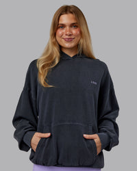 Woman wearing 1% Better Value Series Oversized Hoodie - Black-Violet Ray | Model:Emilie | Size:XS | Thumbnail Index: 3