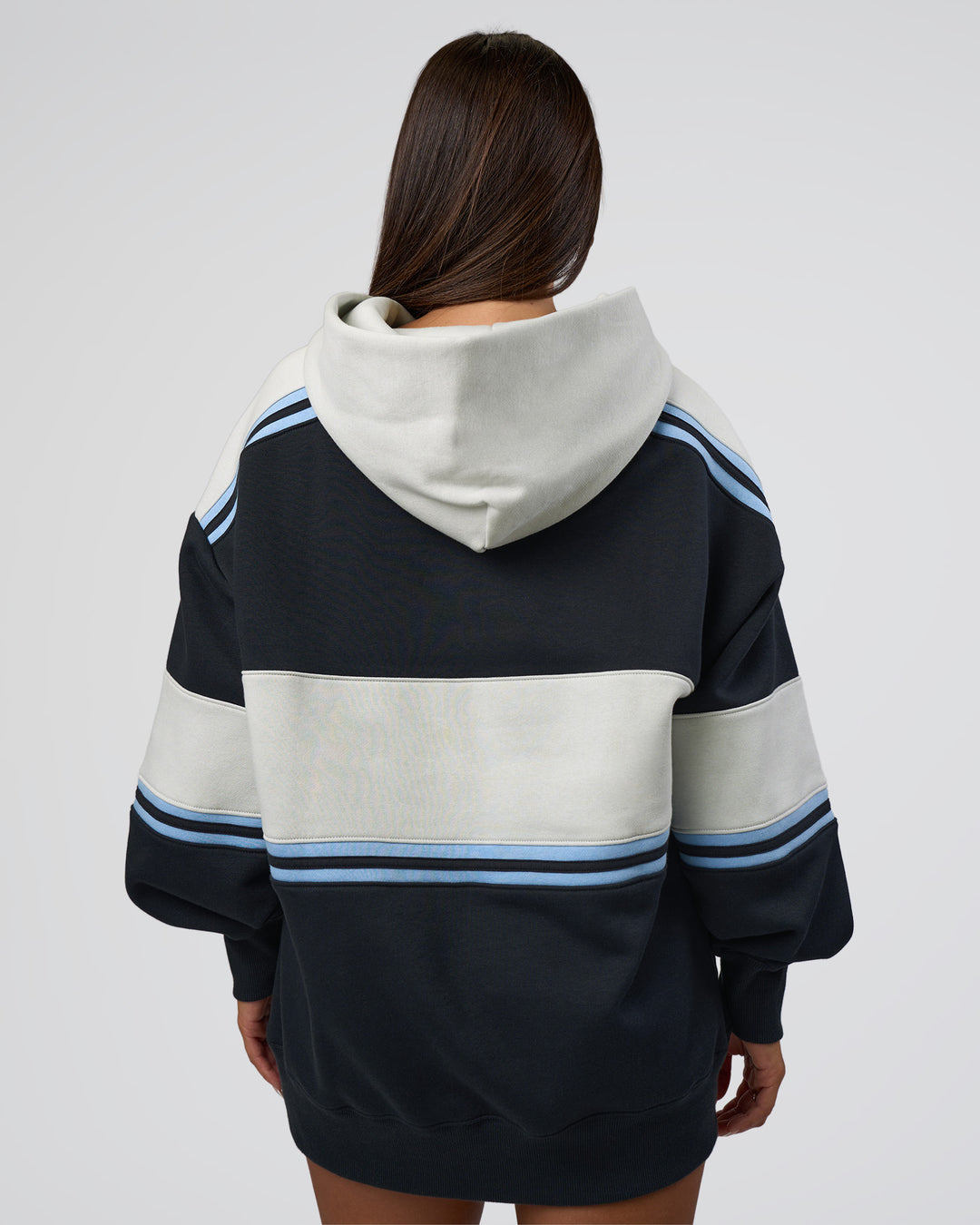 Woman wearing A-Team Oversized Hoodie - Caviar-Open Air | Model:Bianca | Size:XS - view 3