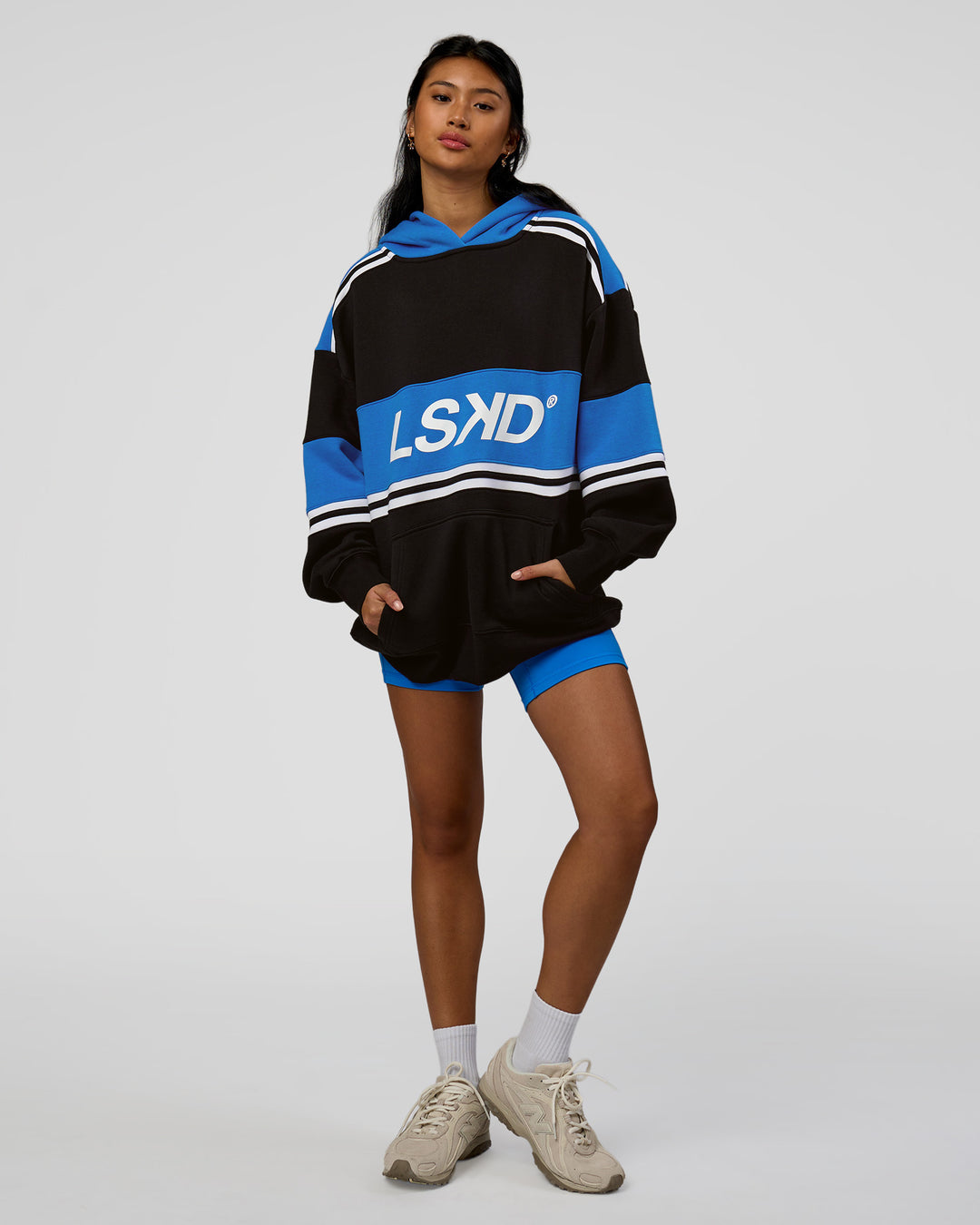 Woman wearing A-Team Oversized Hoodie - Caviar-Palace Blue | Model:Loren | Size:XS - view 12