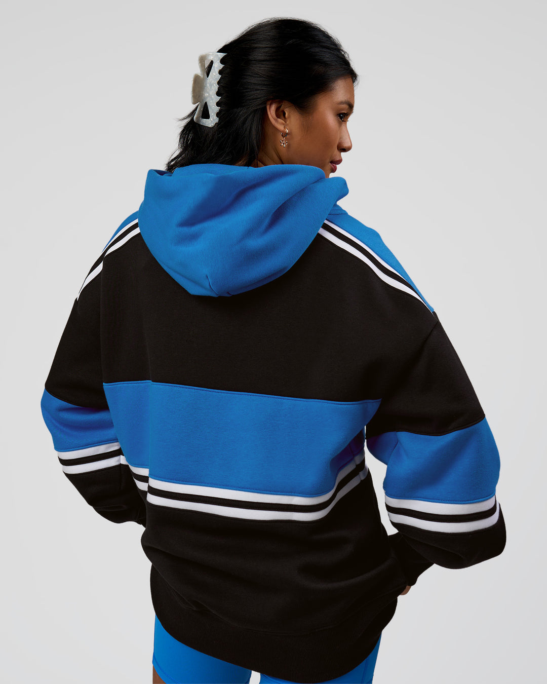 Woman wearing A-Team Oversized Hoodie - Caviar-Palace Blue | Model:Loren | Size:XS - view 8