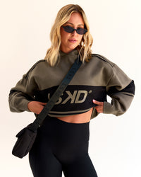 Woman wearing A-Team Oversized Hoodie - Walnut Grey-Caviar | Model:Taylah | Size:XS | Thumbnail Index: 3