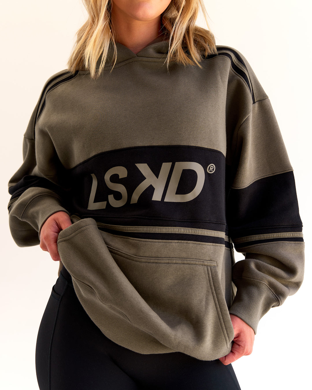 Woman wearing A-Team Oversized Hoodie - Walnut Grey-Caviar | Model:Taylah | Size:XS - view 10
