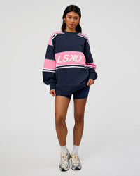 Woman wearing A-Team Sweater Oversize - Future Navy-Candy Pink | Model:Loren | Size:XS | Thumbnail Index: 8