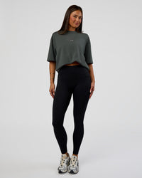Woman wearing Abstract Haze FLXCotton Tee - Carbon Green-Cantaloupe | Model:Bianca | Size:XS | Thumbnail Index: 7