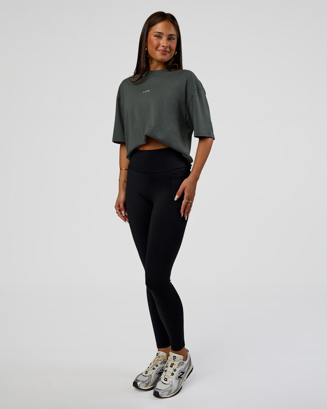 Woman wearing Abstract Haze FLXCotton Tee - Carbon Green-Cantaloupe | Model:Bianca | Size:XS - view 11