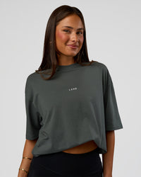 Woman wearing Abstract Haze FLXCotton Tee - Carbon Green-Cantaloupe | Model:Bianca | Size:XS | Thumbnail Index: 4