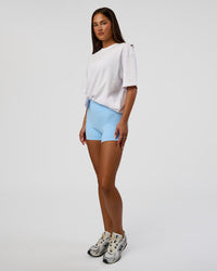 Woman wearing Abstract Haze FLXCotton Tee - White-Blue Aura | Model:Bianca | Size:XS | Thumbnail Index: 10
