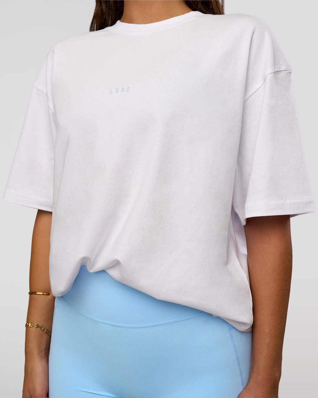 Woman wearing Abstract Haze FLXCotton Tee - White-Blue Aura | Model:Bianca | Size:XS - view 9