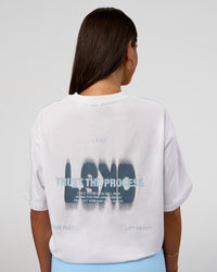 Woman wearing Abstract Haze FLXCotton Tee - White-Blue Aura | Model:Bianca | Size:XS | Thumbnail Index: 3
