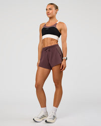Woman wearing Accelerate 3" High-Rise Running Short - Cocoa Powder | Model:Maja | Size:XS | Thumbnail Index: 7