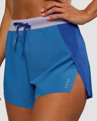 Woman wearing Accelerate 3" High-Rise Running Short - Electric Indigo-Multi | Set:true | Angle:closeup | Model:Brylee | Size:XS | Thumbnail Index: 4