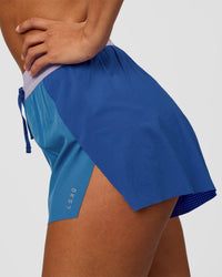 Woman wearing Accelerate 3" High-Rise Running Short - Electric Indigo-Multi | Model:Brylee | Size:XS | Thumbnail Index: 0