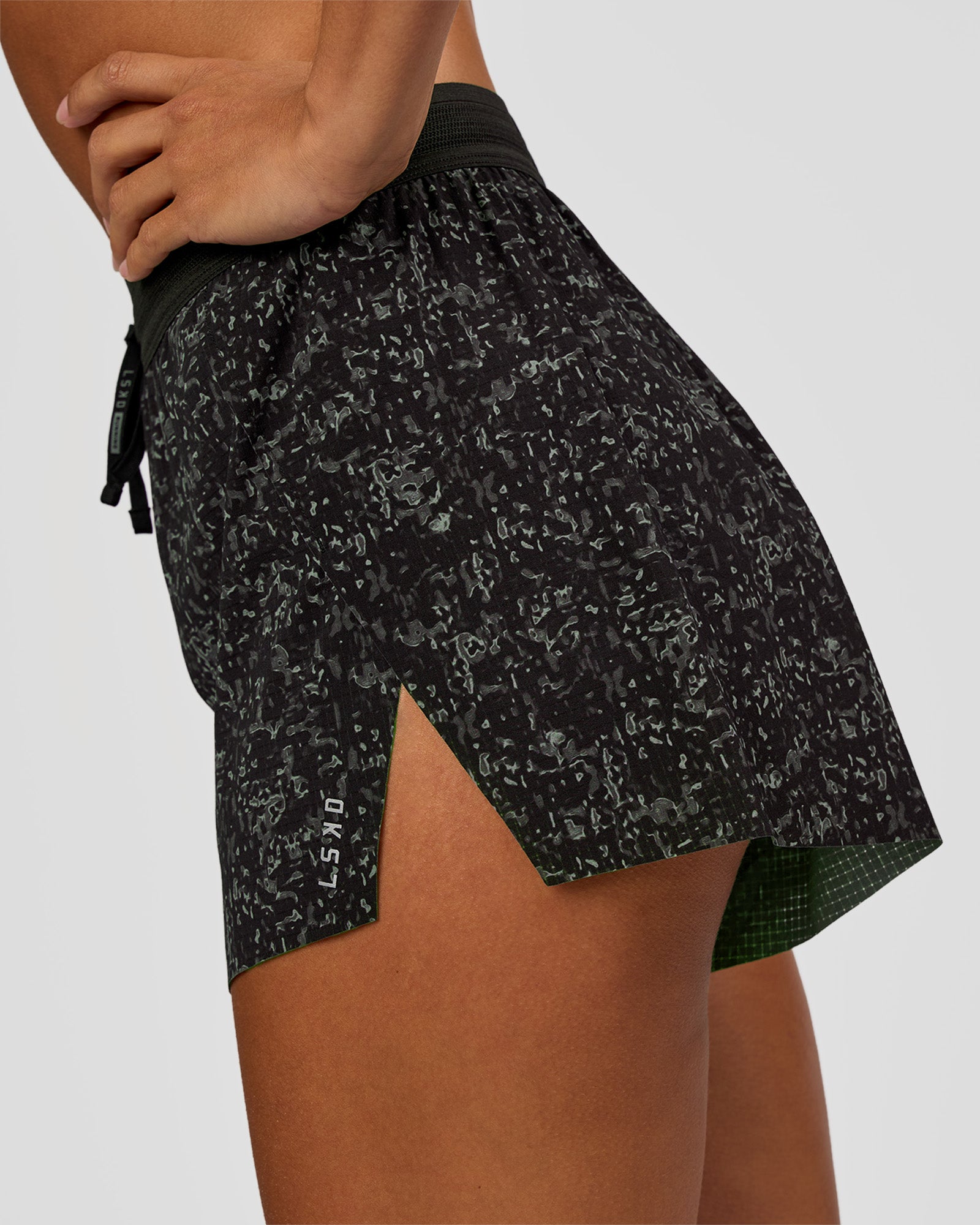 Woman wearing Accelerate 3" High-Rise Running Short - Energy Print Black | Model:Brylee | Size:XS