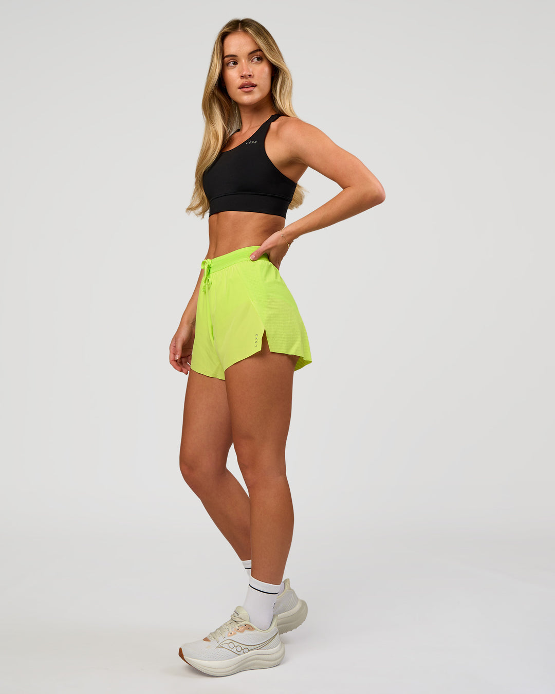 Woman wearing Accelerate 3" High-Rise Running Short in Hyper Green | Model:Issy | Sizze:XS - view 5