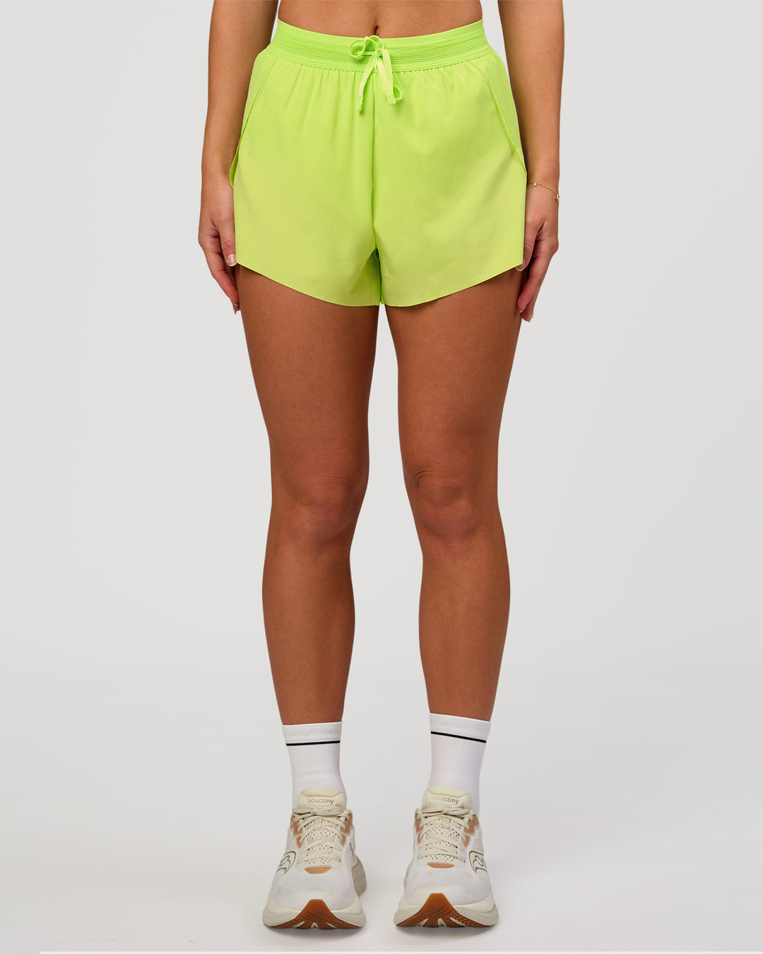 Woman wearing Accelerate 3" High-Rise Running Short in Hyper Green | Model:Issy | Sizze:XS - view 3