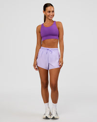 Woman wearing Accelerate 3" High-Rise Running Short - Pale Lilac | Model:Brylee | Size:XS | Thumbnail Index: 4